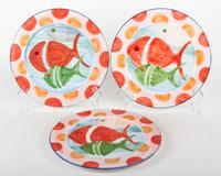 Fourteen Glazed Pottery Plates Diameter 12 1/2 inches.