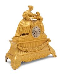 A Louis Philippe Gilt Bronze Figural Mantel Clock