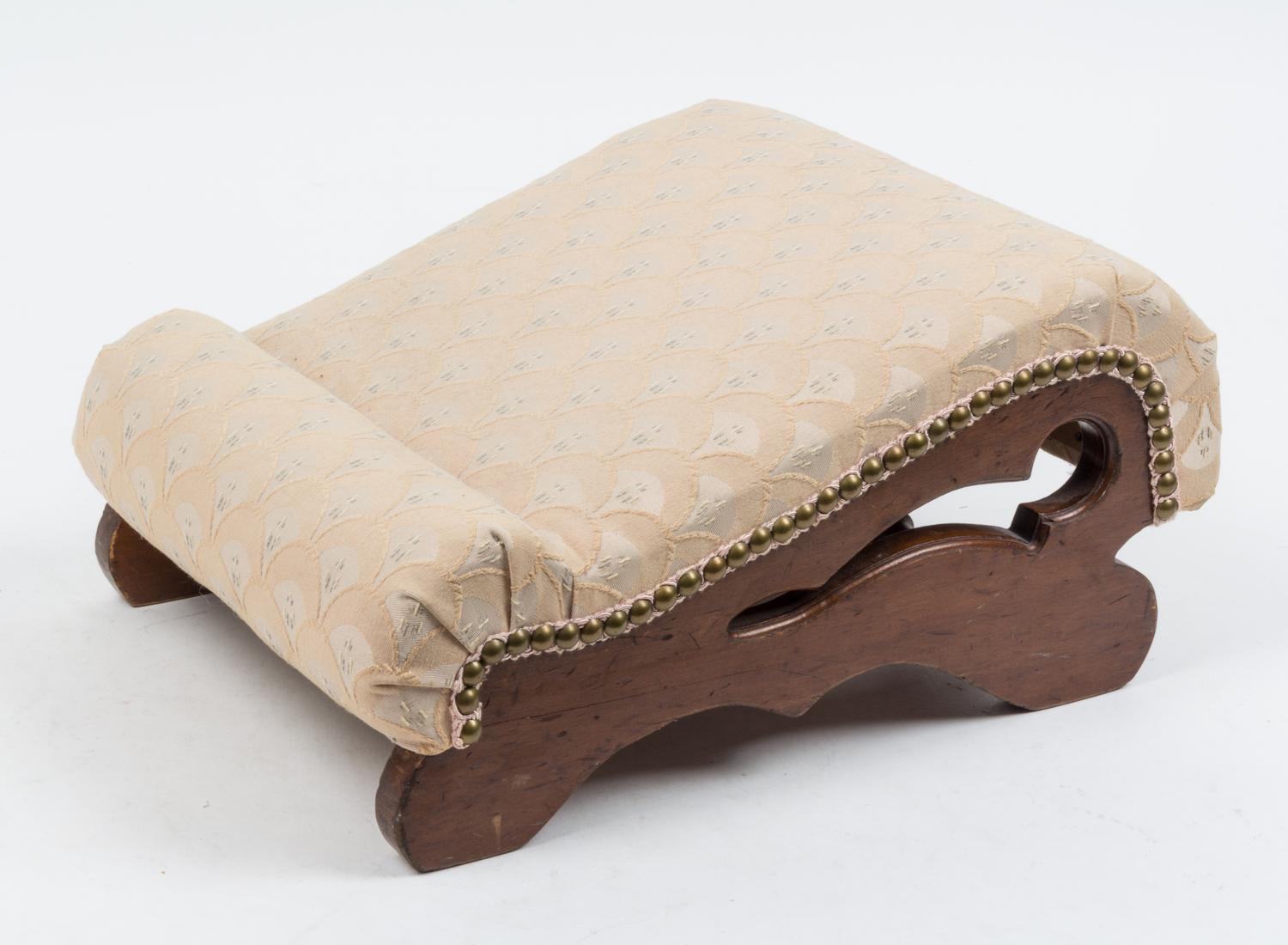 A Victorian Walnut Gout Stool Height 7 7/8 x width 12 1/4 x depth 16 1/2 inches. — 19TH CENTURY