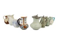 A Collection of Eight English Salt Glazed Relief Form Pitchers and Molded Earthenware — 19TH CENTURY
