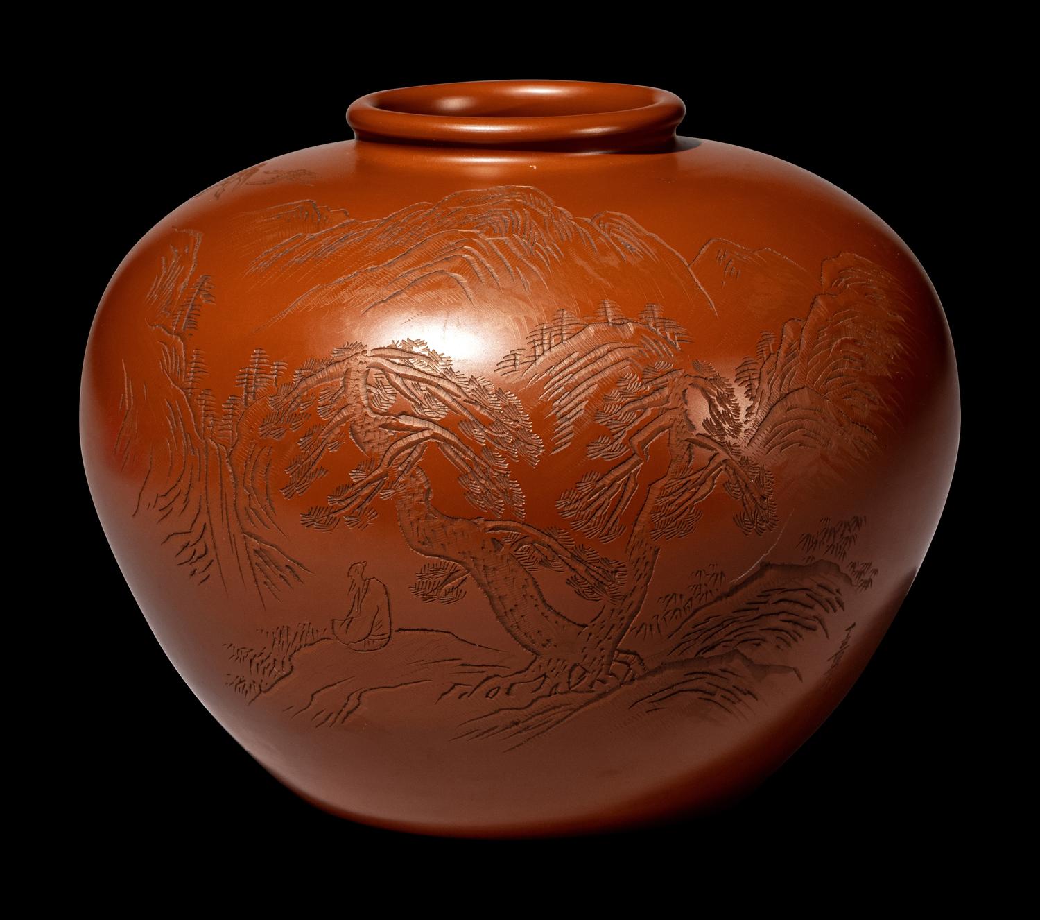 A Japanese Persimmon Glazed Pottery 'Landscape' Jar