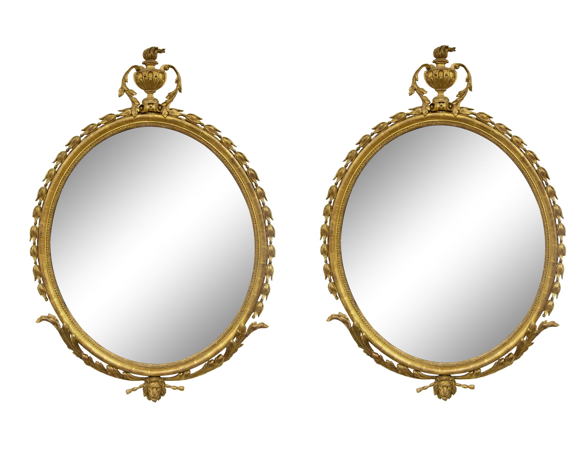 A Pair of George II Style Oval Giltwood Mirrors