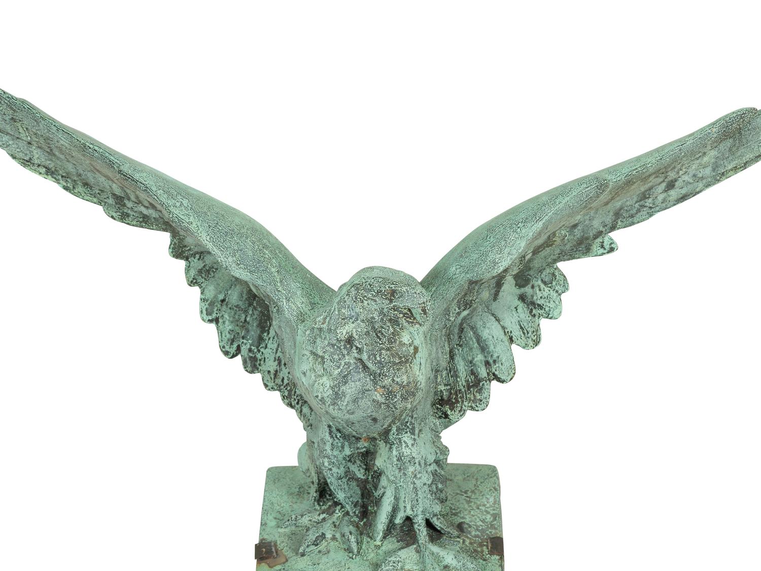 A Patinated Cast Metal Eagle Architectural Ornament with Verdigris Patina