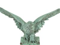 A Patinated Cast Metal Eagle Architectural Ornament with Verdigris Patina