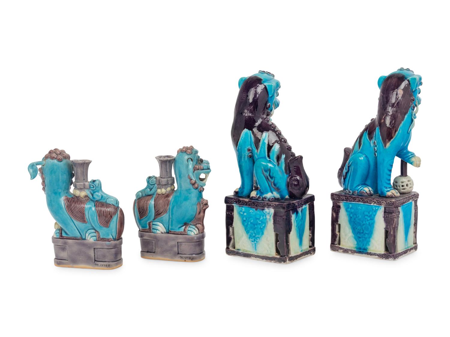Two Pairs of Chinese Turquoise, Yellow and Purple Glazed Porcelain Figures of Fu Lions