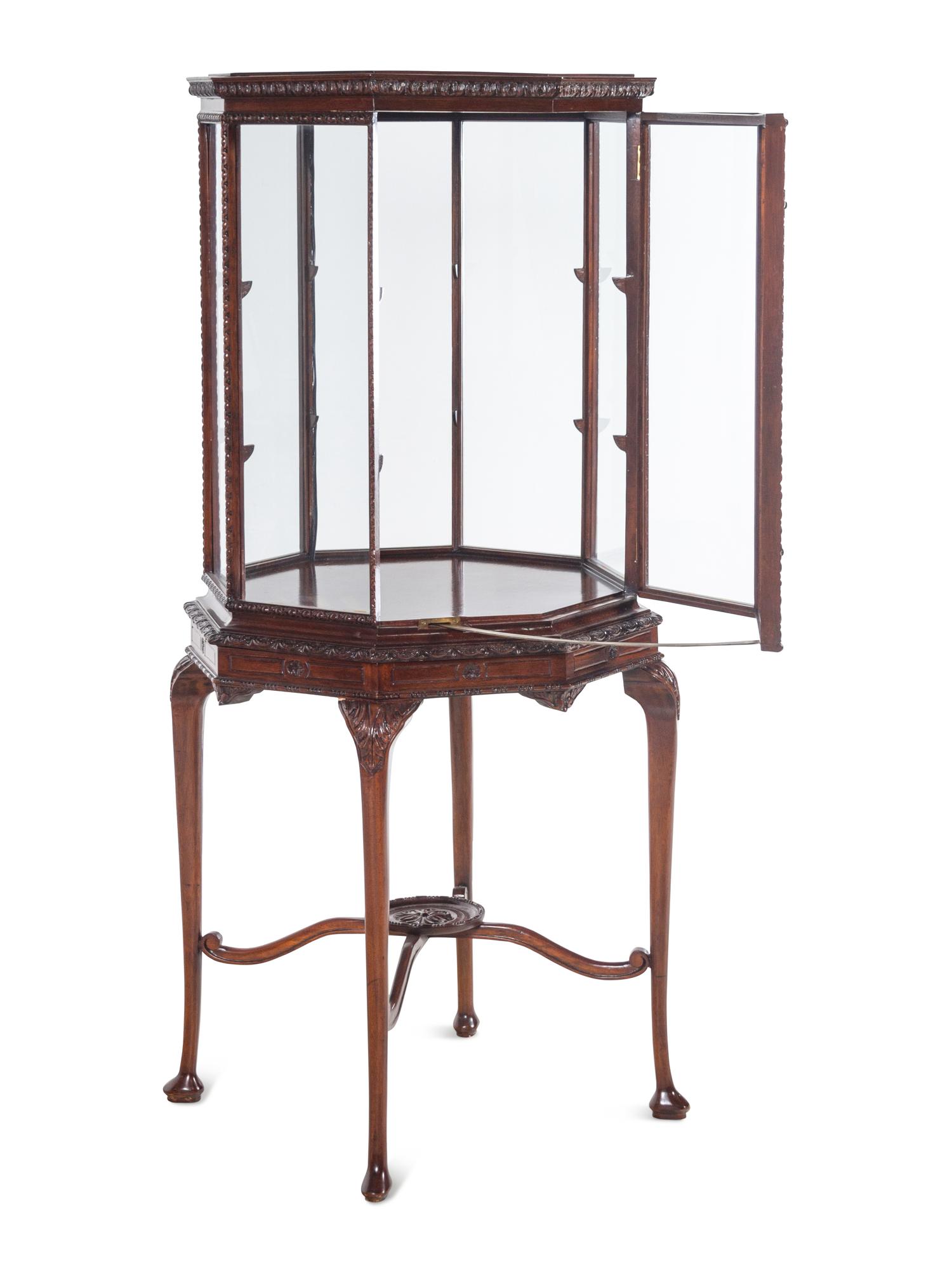 A George III Style Carved Mahogany Octagonal Vitrine