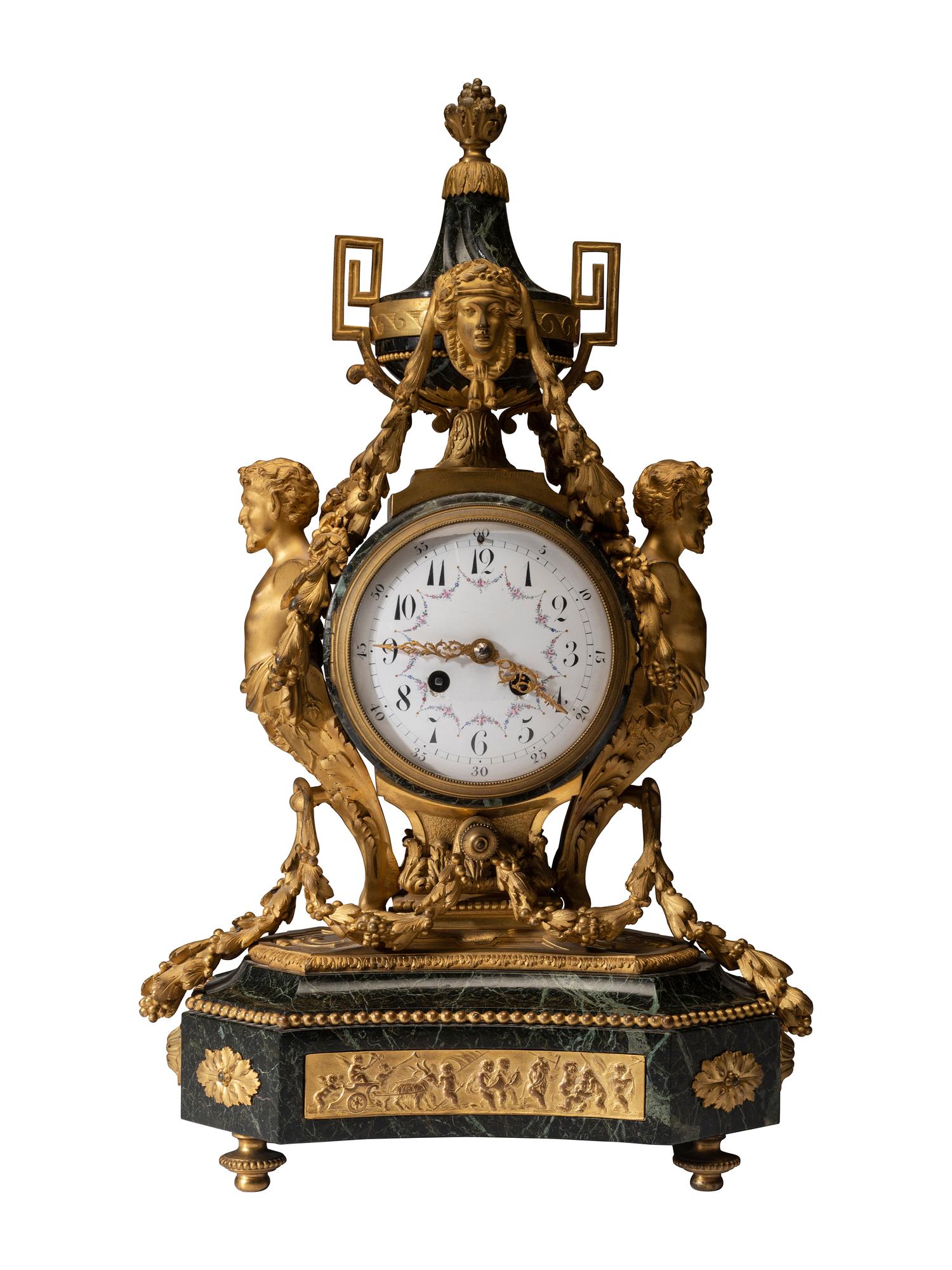 A Napoleon III Gilt Bronze and Marble Clock