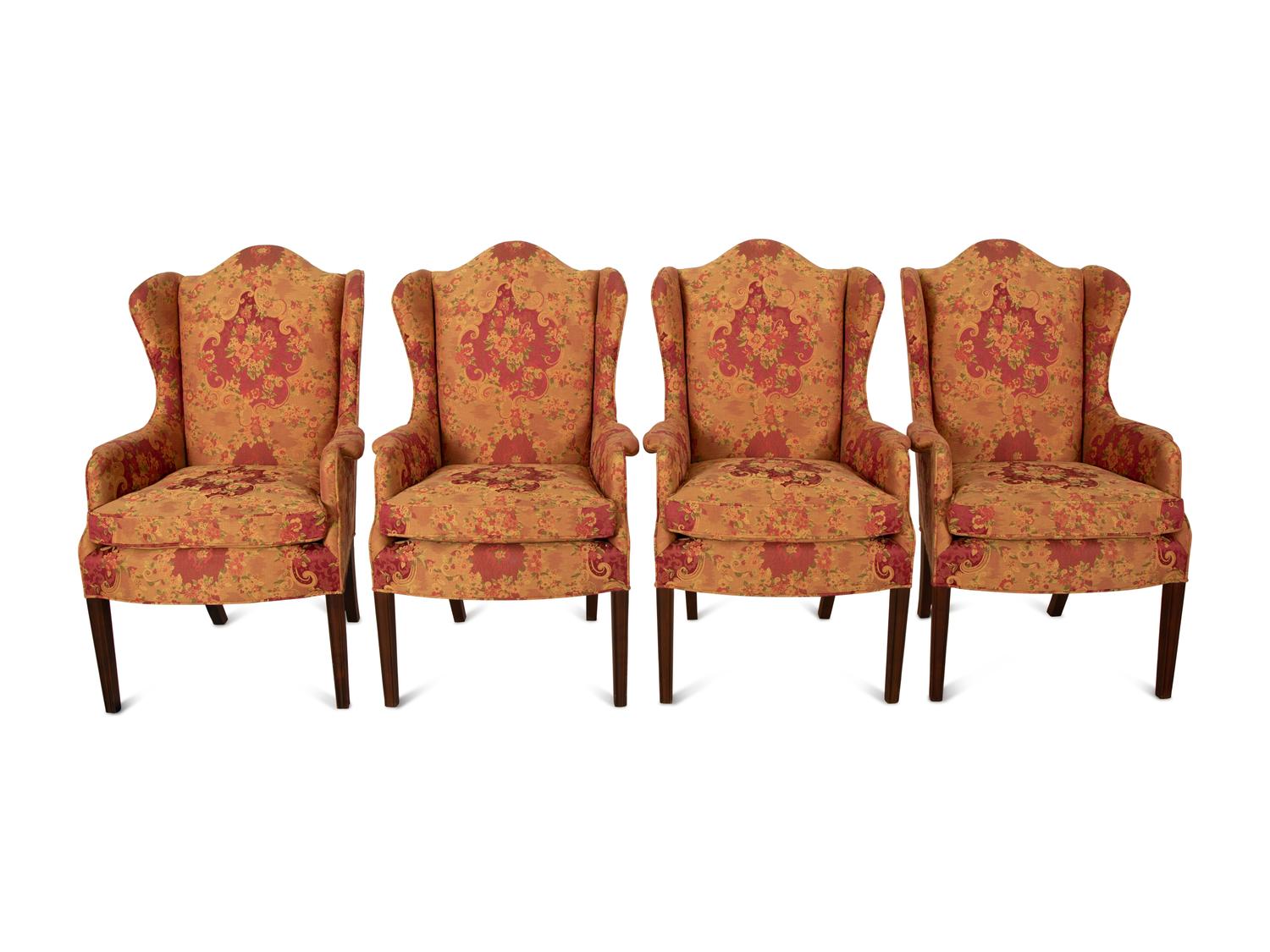 A Set of Seven George III Style Mahogany Wing Back Armchairs
