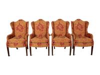 A Set of Seven George III Style Mahogany Wing Back Armchairs