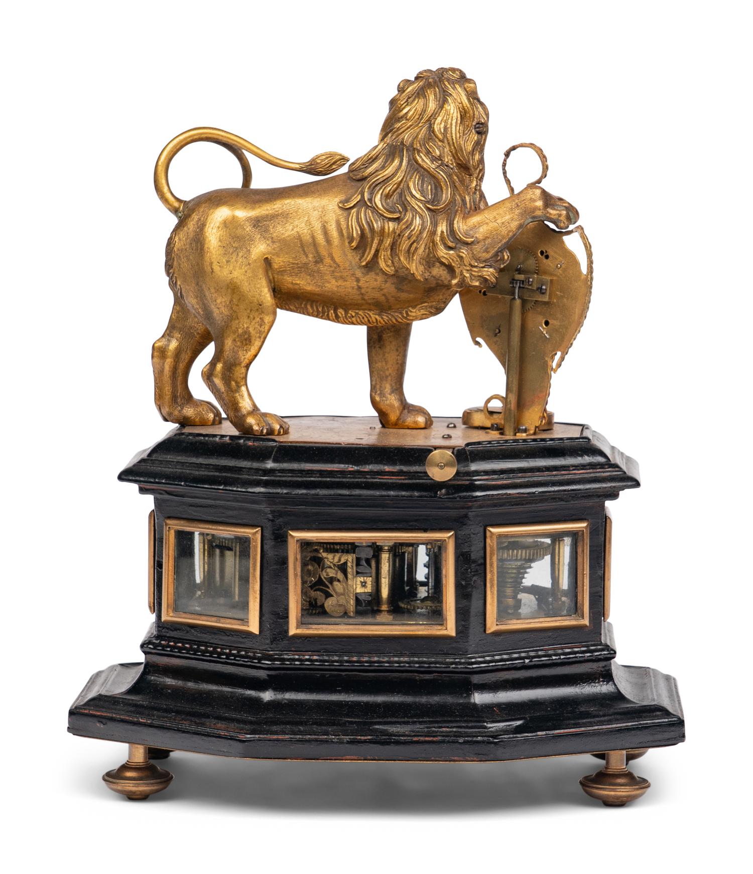 A German Gilt Brass Quarter-Striking Automaton Clock with Lion