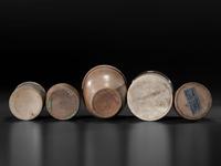 Twenty Stoneware Vessels