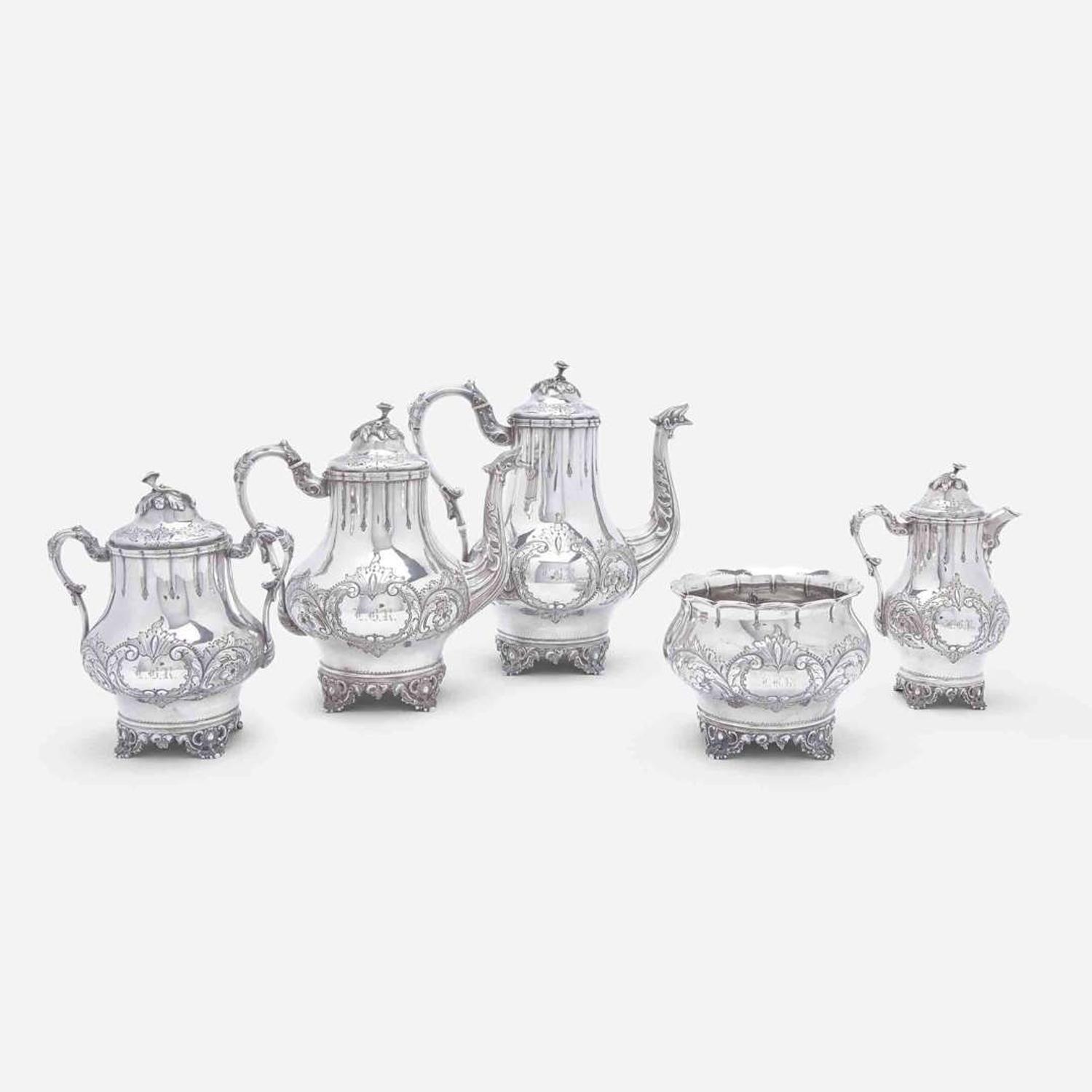 A five-piece coin silver repoussé tea and coffee service Wood & Hughes, New York, NY, circa 1850