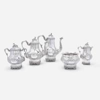 A five-piece coin silver repoussé tea and coffee service Wood & Hughes, New York, NY, circa 1850