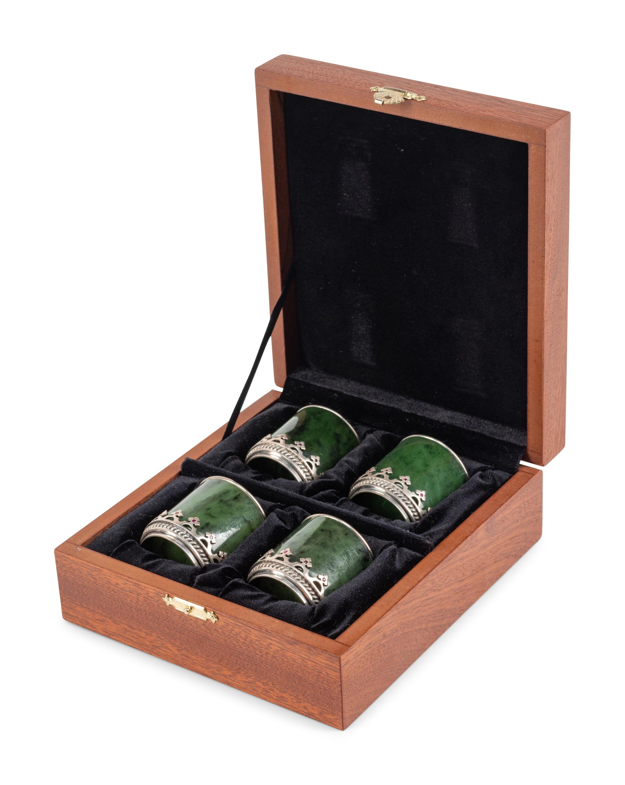 A Set of Four Silver and Ruby Mounted Spinach Jade Cups