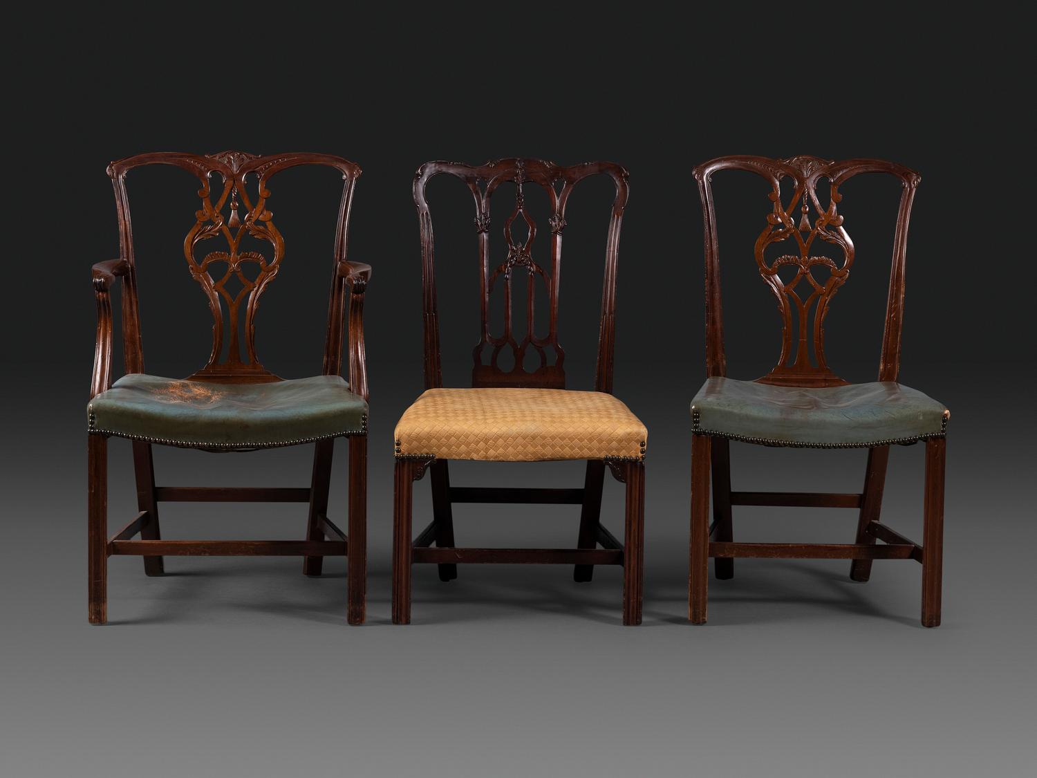 A Set of Six Chippendale Style Carved Mahogany Dining Chairs