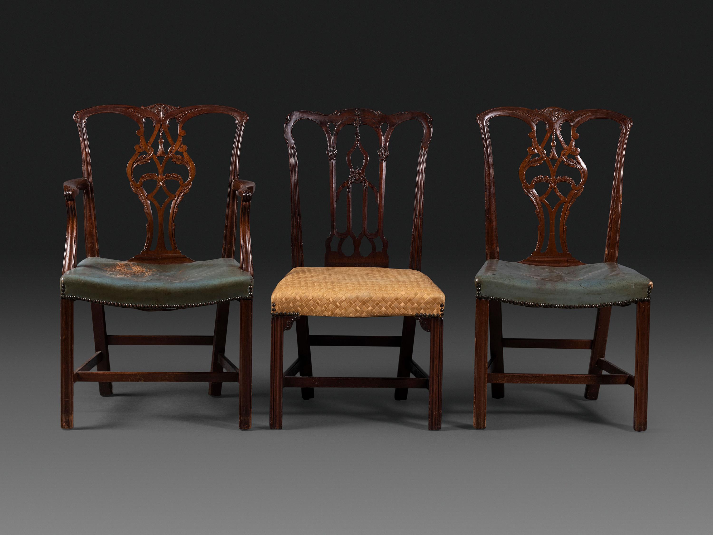 A Set of Six Chippendale Style Carved Mahogany Dining Chairs