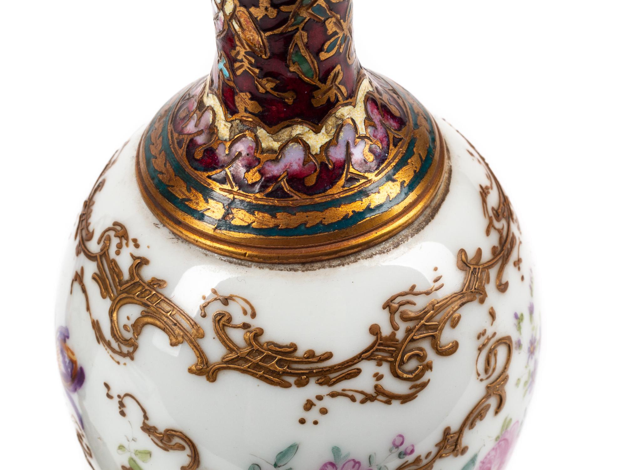 A Pair of French Porcelain, Gilt Bronze and Champlevé Urns