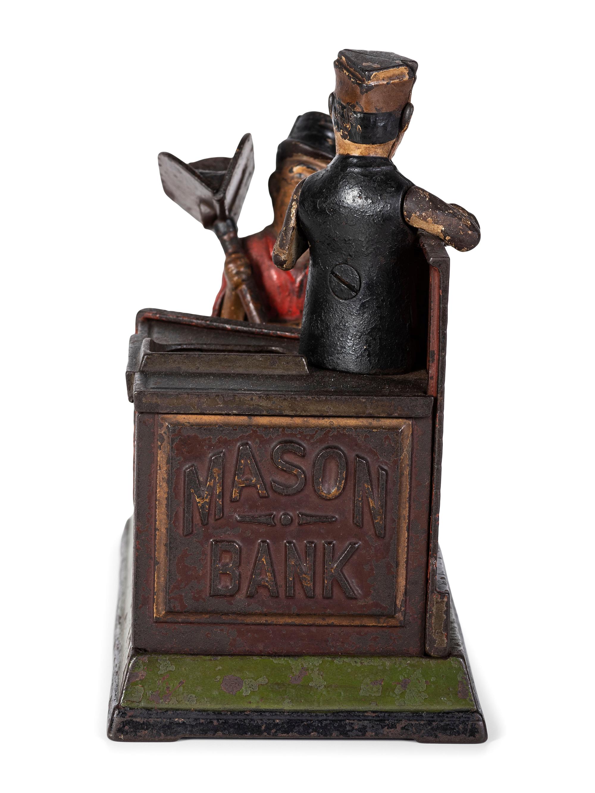 A Shephard Hardware Excelsior Series 'Mason' Cast Iron Mechanical Bank
