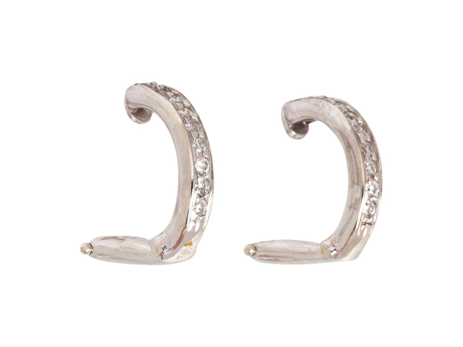 A Pair of White Gold and Diamond Earclips,