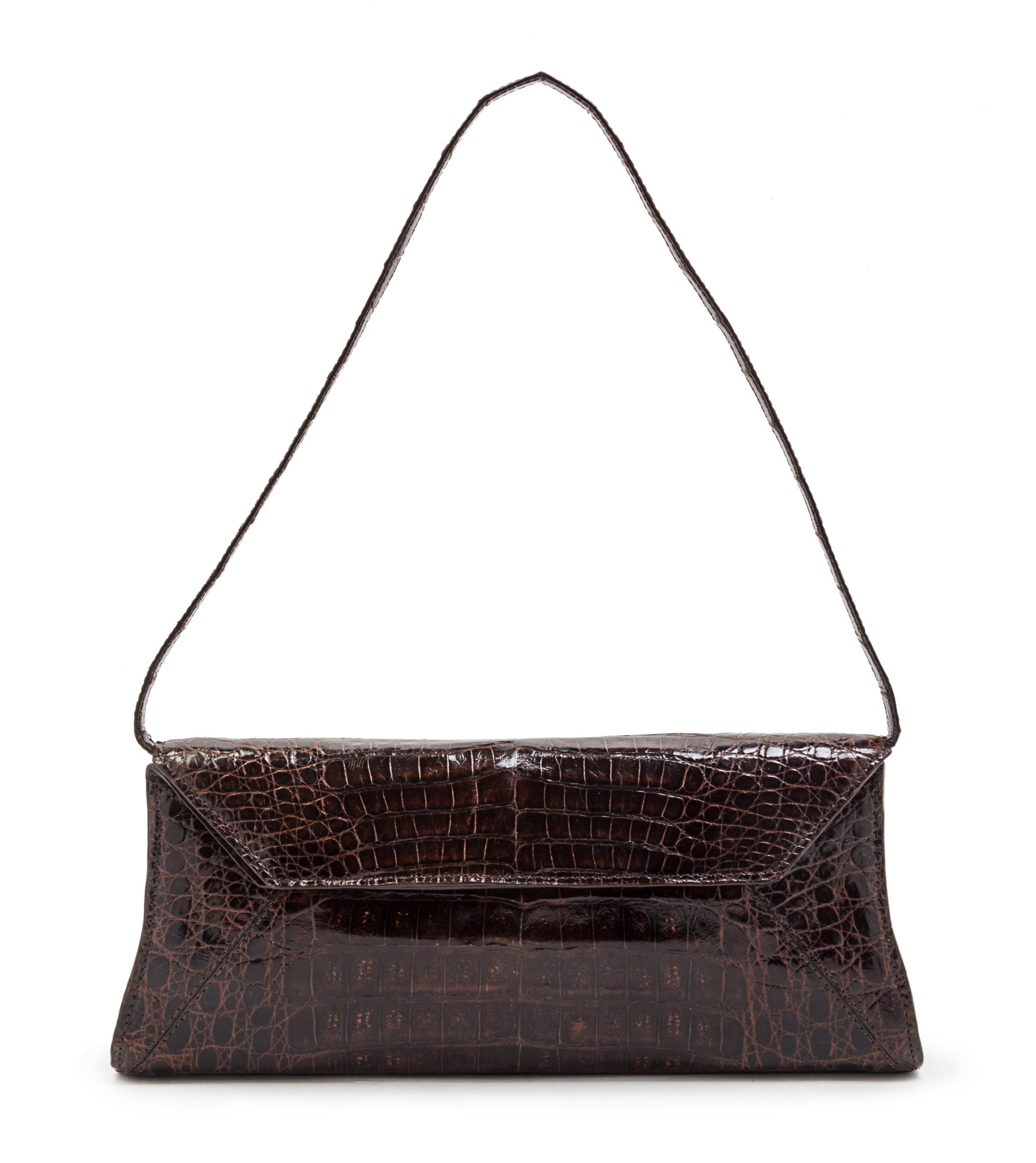 A Nancy Gonzalez Crocodile Convertible Bag, 11 x 4 1/2 x 2 inches.