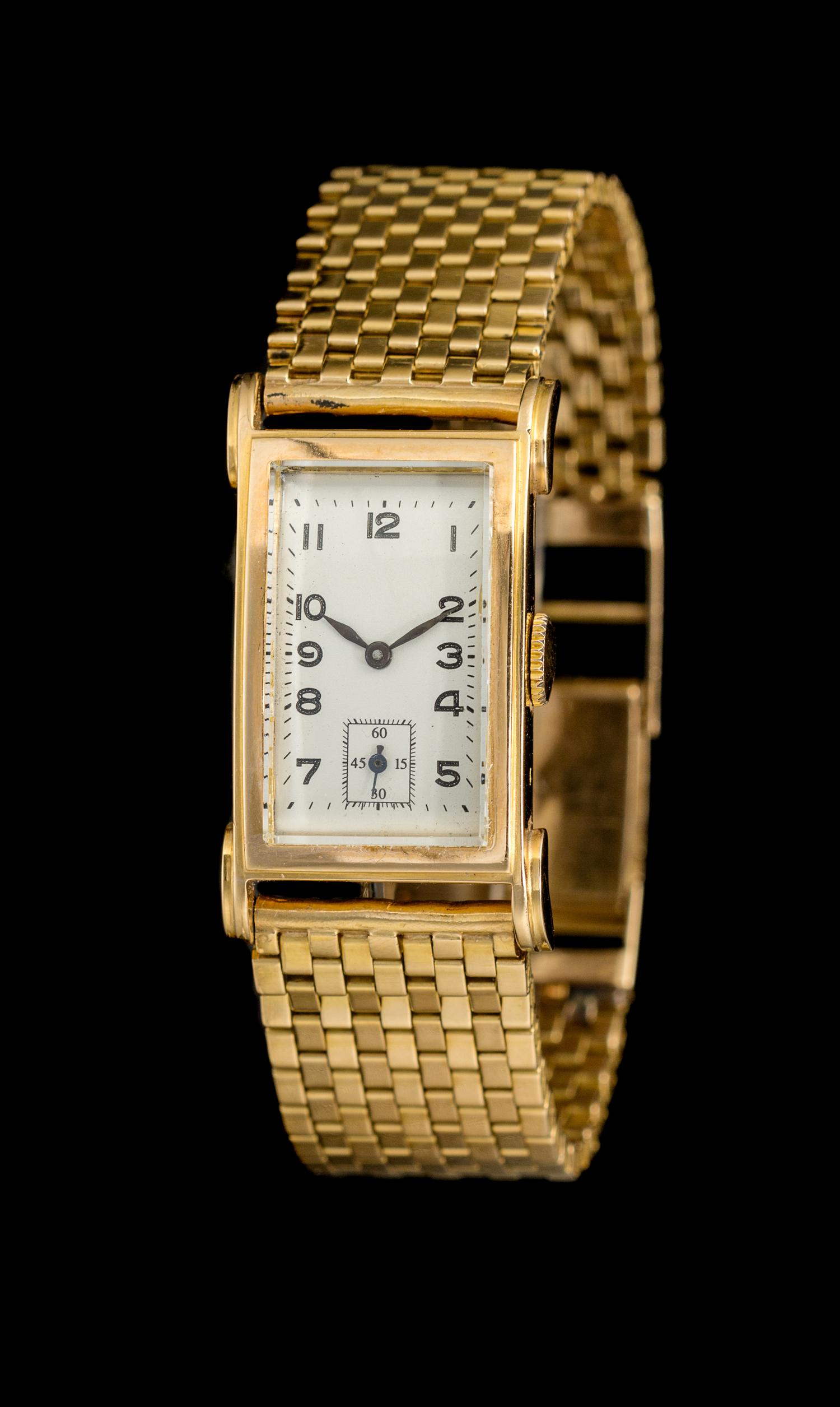 An 18 Karat Yellow Gold Wristwatch,