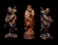 Seven Chinese Carved Hardwood Figures
