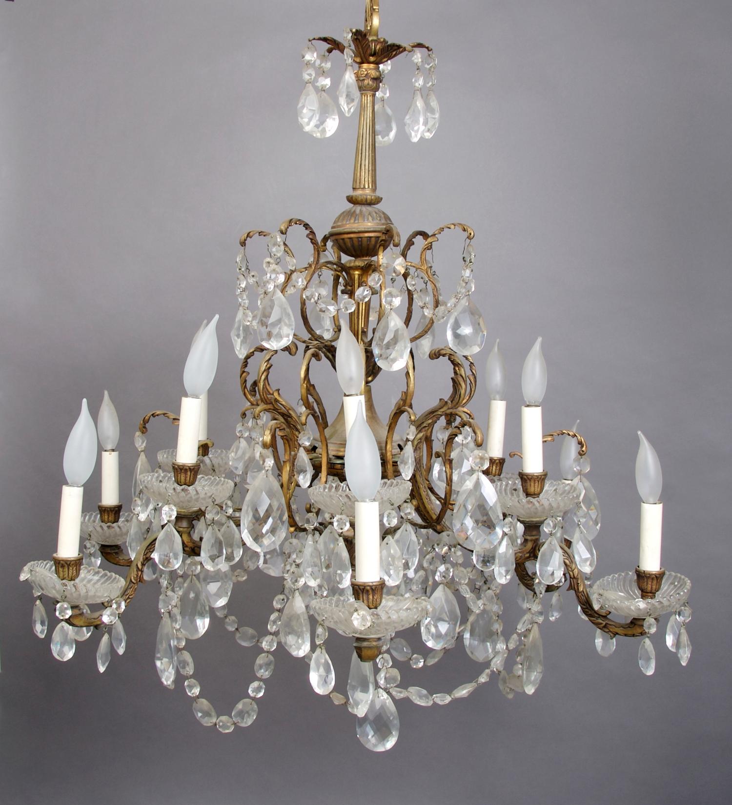 A Baluster Form Twelve-Light Chandelier, Height 26 inches.