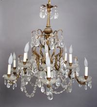 A Baluster Form Twelve-Light Chandelier, Height 26 inches.