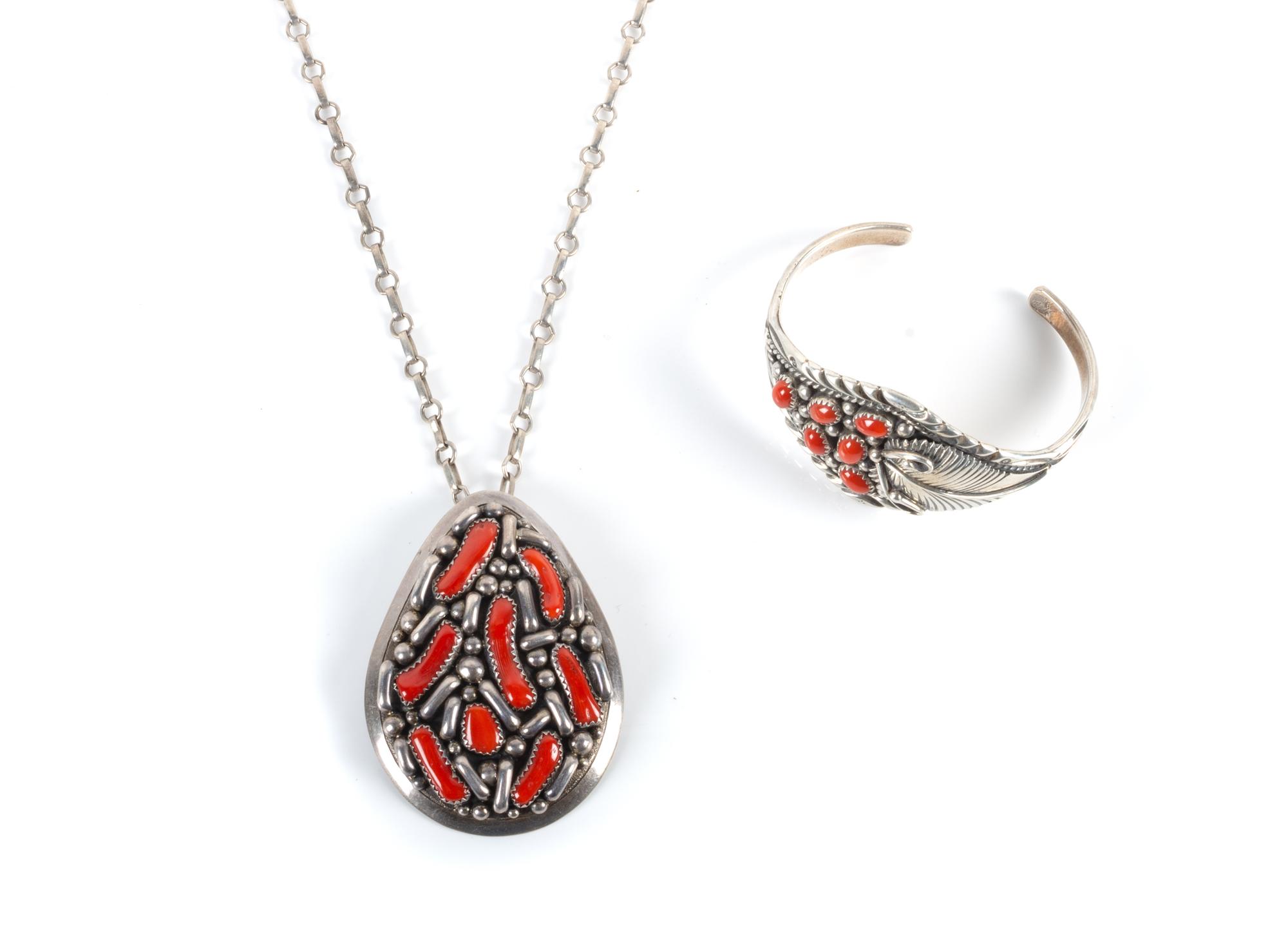 A Southwestern Silver and Coral Bracelet and Pendant Length 5 5/8 x opening 1 x width 1 1/2 inches