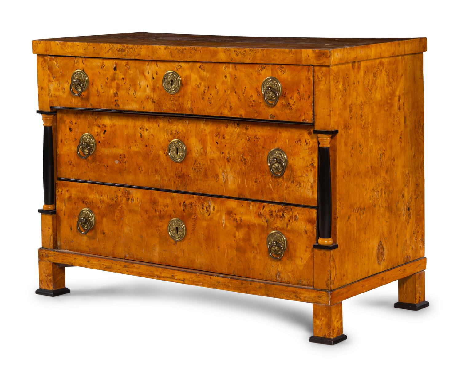 An Austrian or Northern European Parcel Ebonized Burlwood Commode