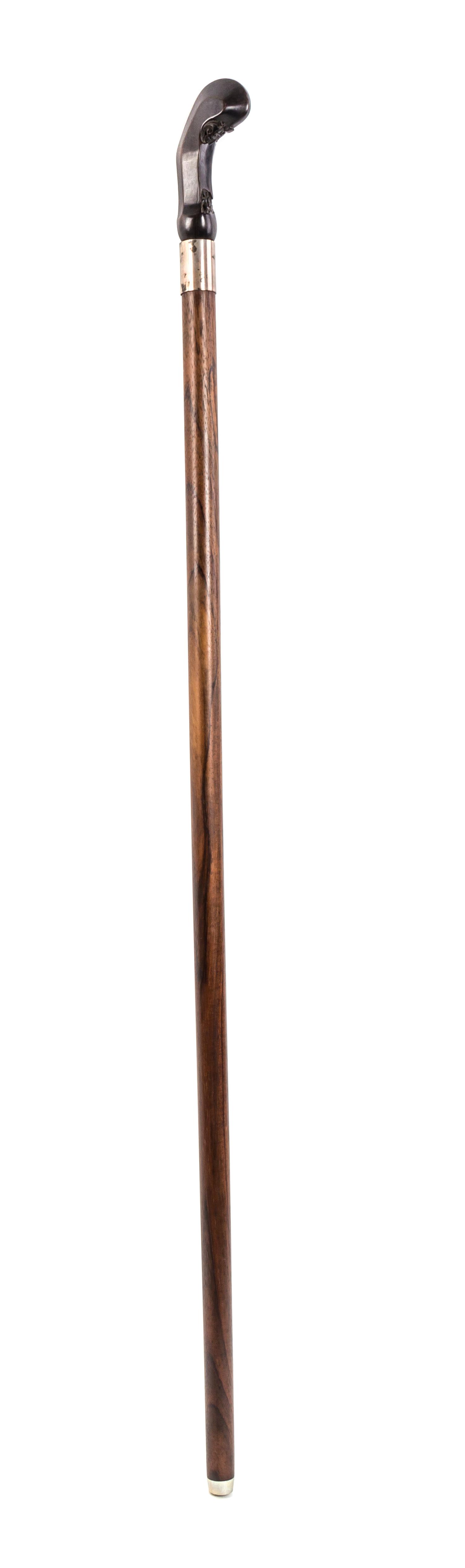 A Continental Sword Cane, Length of handle 4 x length overall 35 3/4 inches.