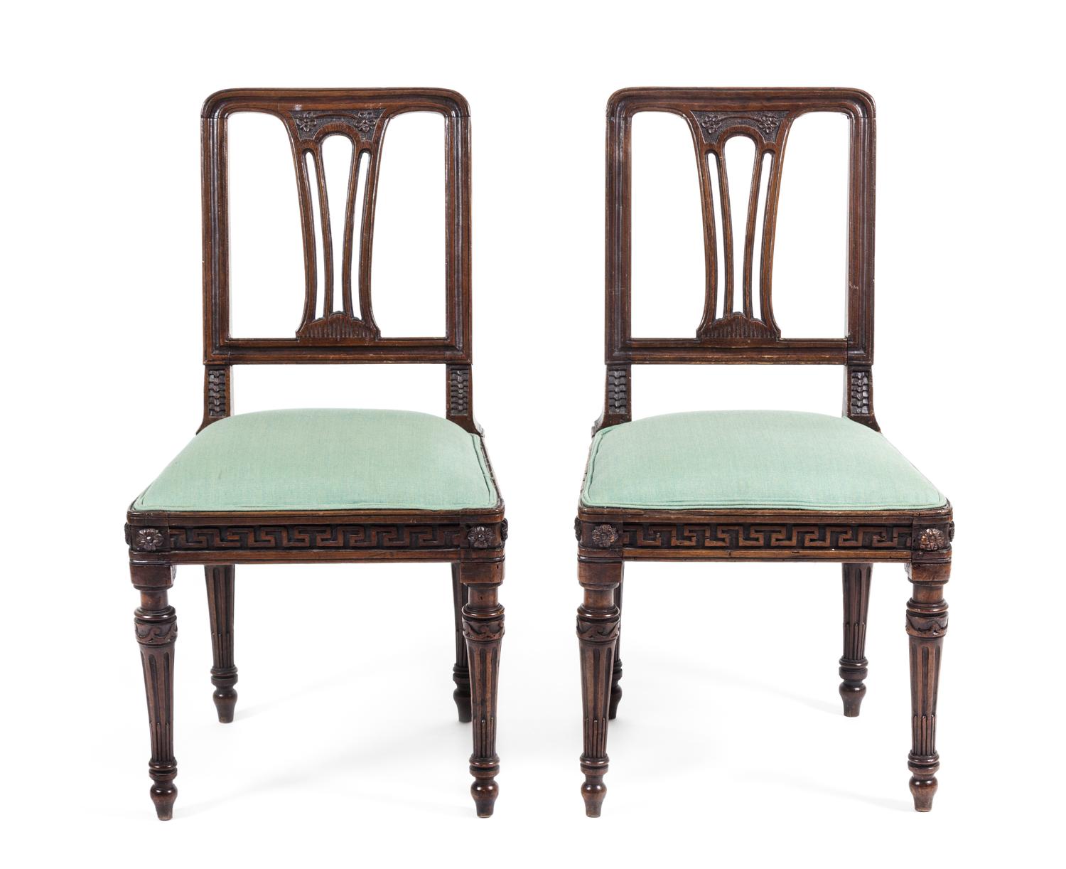 A Pair of Neoclassical Walnut Side Chairs Height 36 3/4 inches.