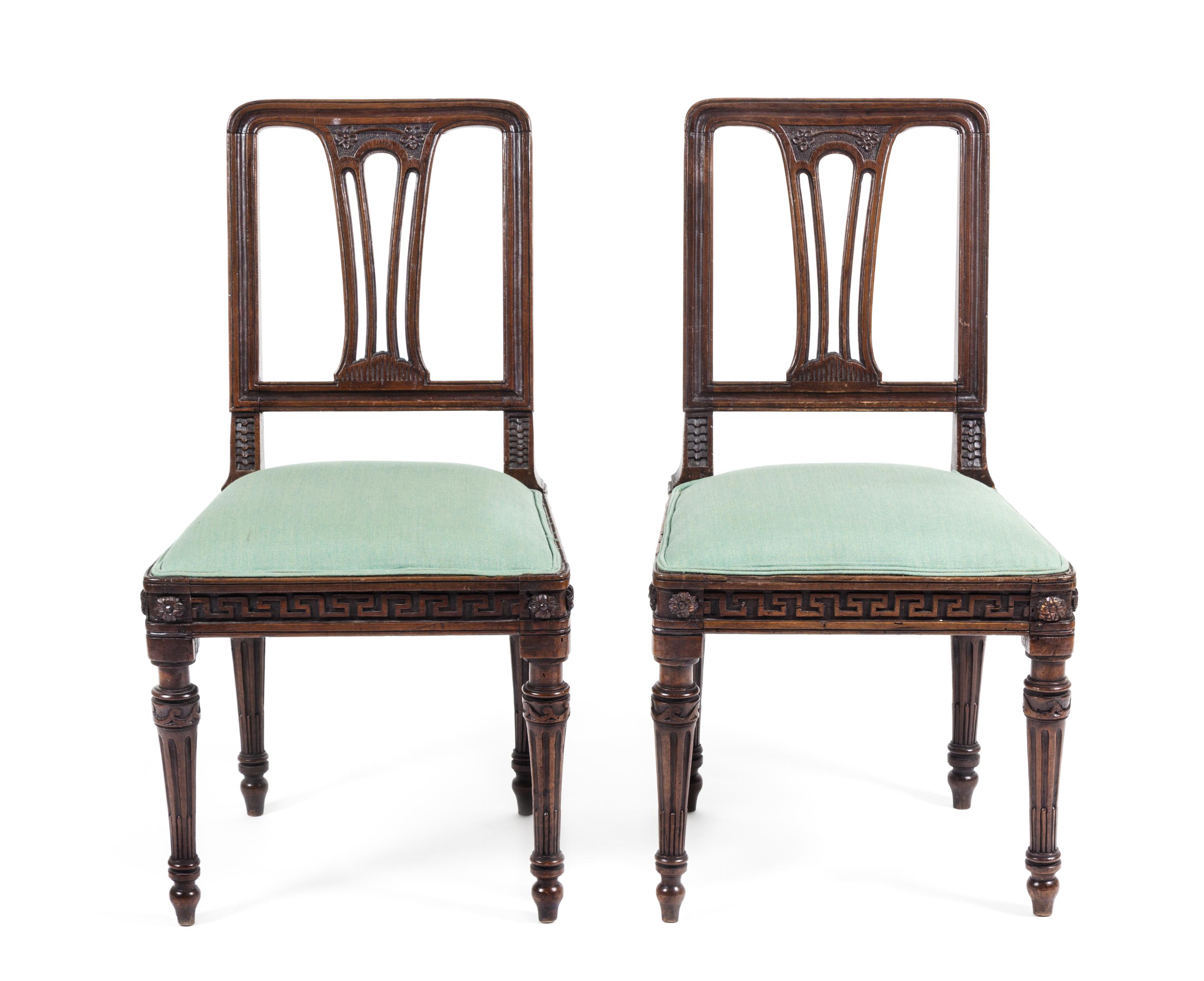 A Pair of Neoclassical Walnut Side Chairs Height 36 3/4 inches.