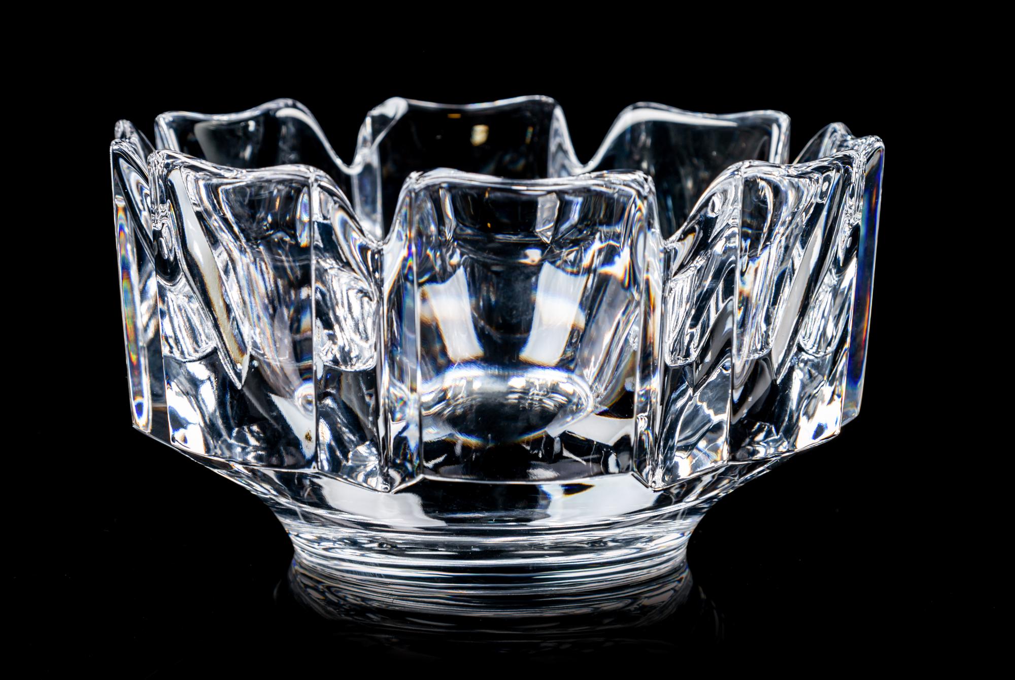 An Orrefors Glass Bowl Height 4 x diameter 7 1/4 inches.