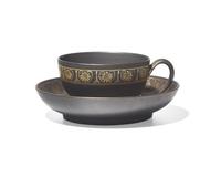 A Wedgwood Neo-Greco Black Basalt Teacup And Saucer