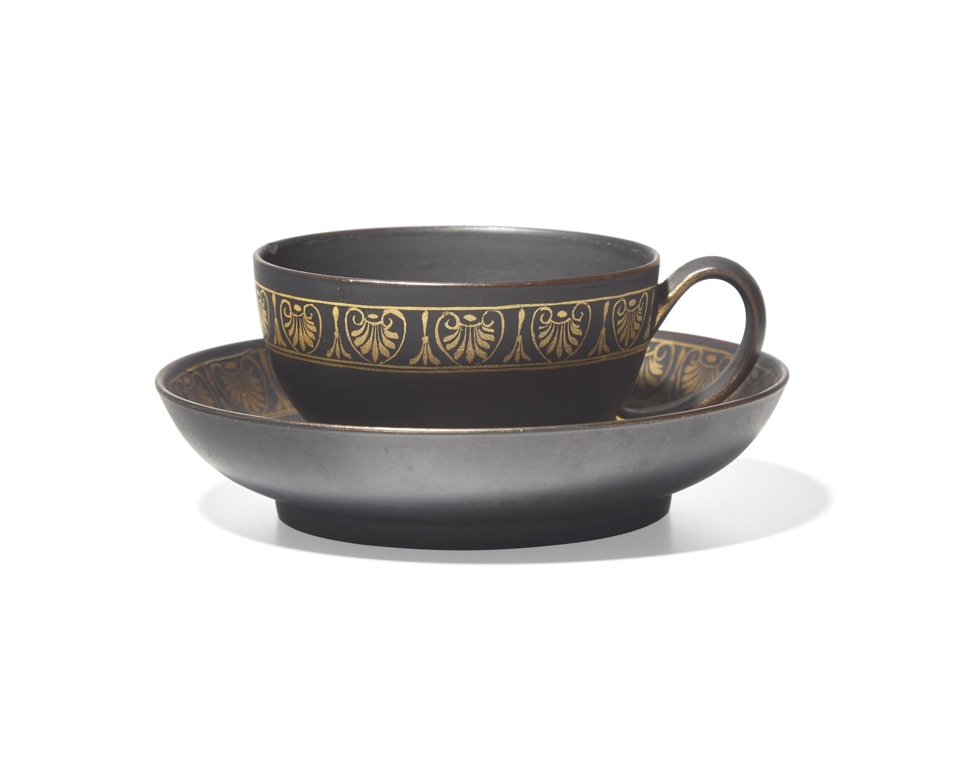 A Wedgwood Neo-Greco Black Basalt Teacup And Saucer