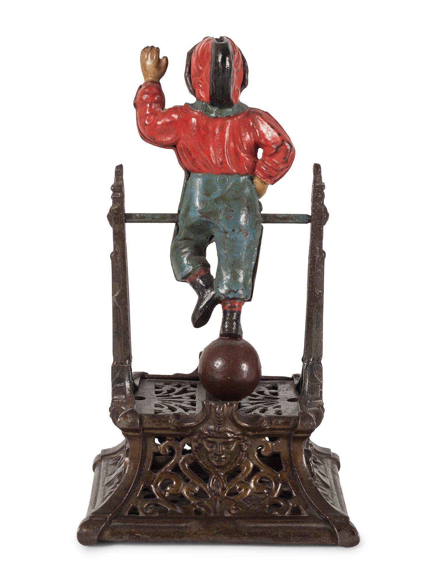 A Trapeze Boy Cast Iron Mechanical Bank