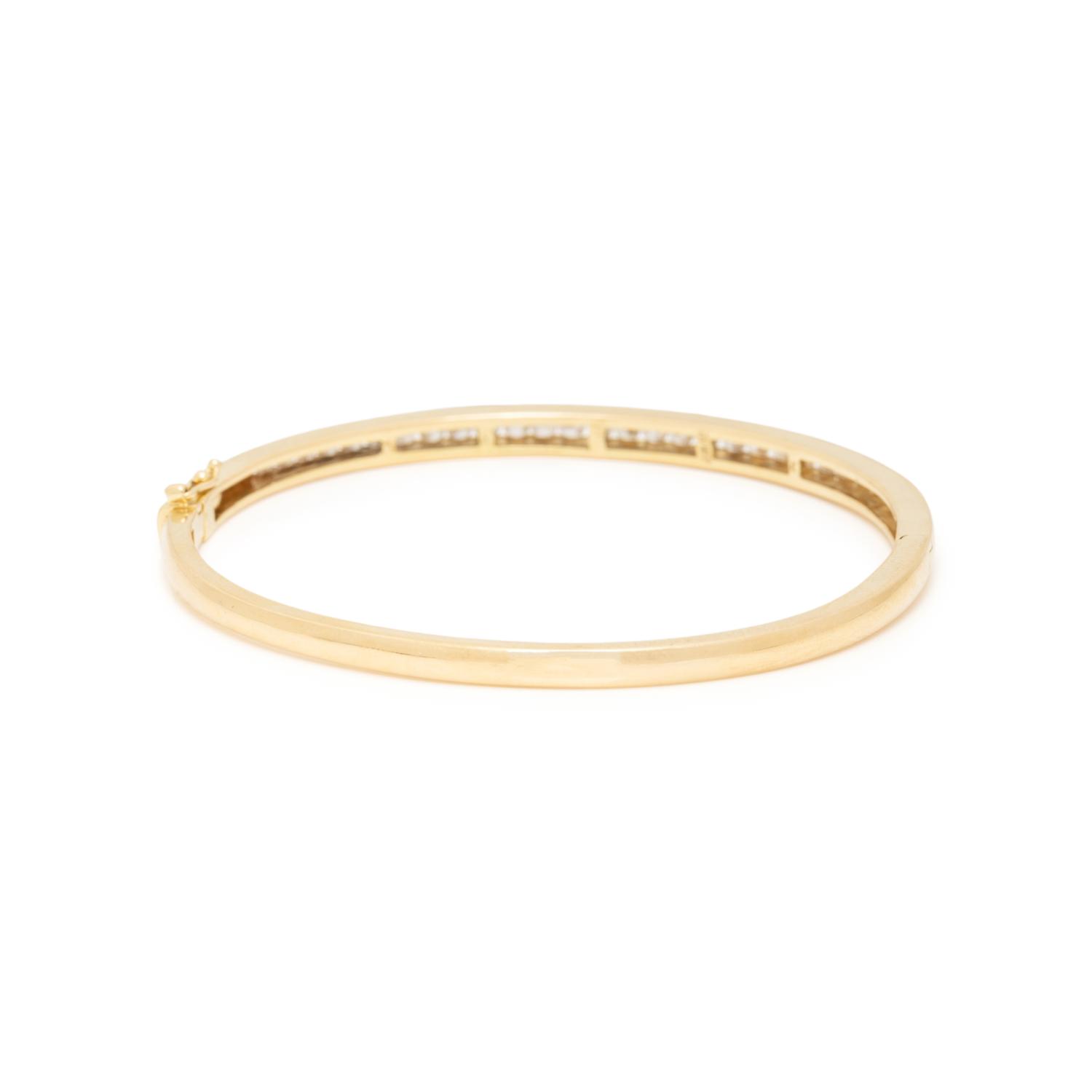 CRAIG DRAKE, DIAMOND AND YELLOW GOLD BANGLE BRACELET