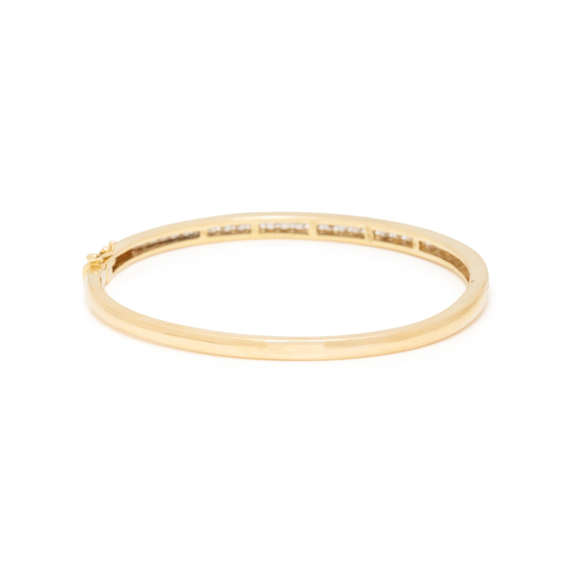 CRAIG DRAKE, DIAMOND AND YELLOW GOLD BANGLE BRACELET