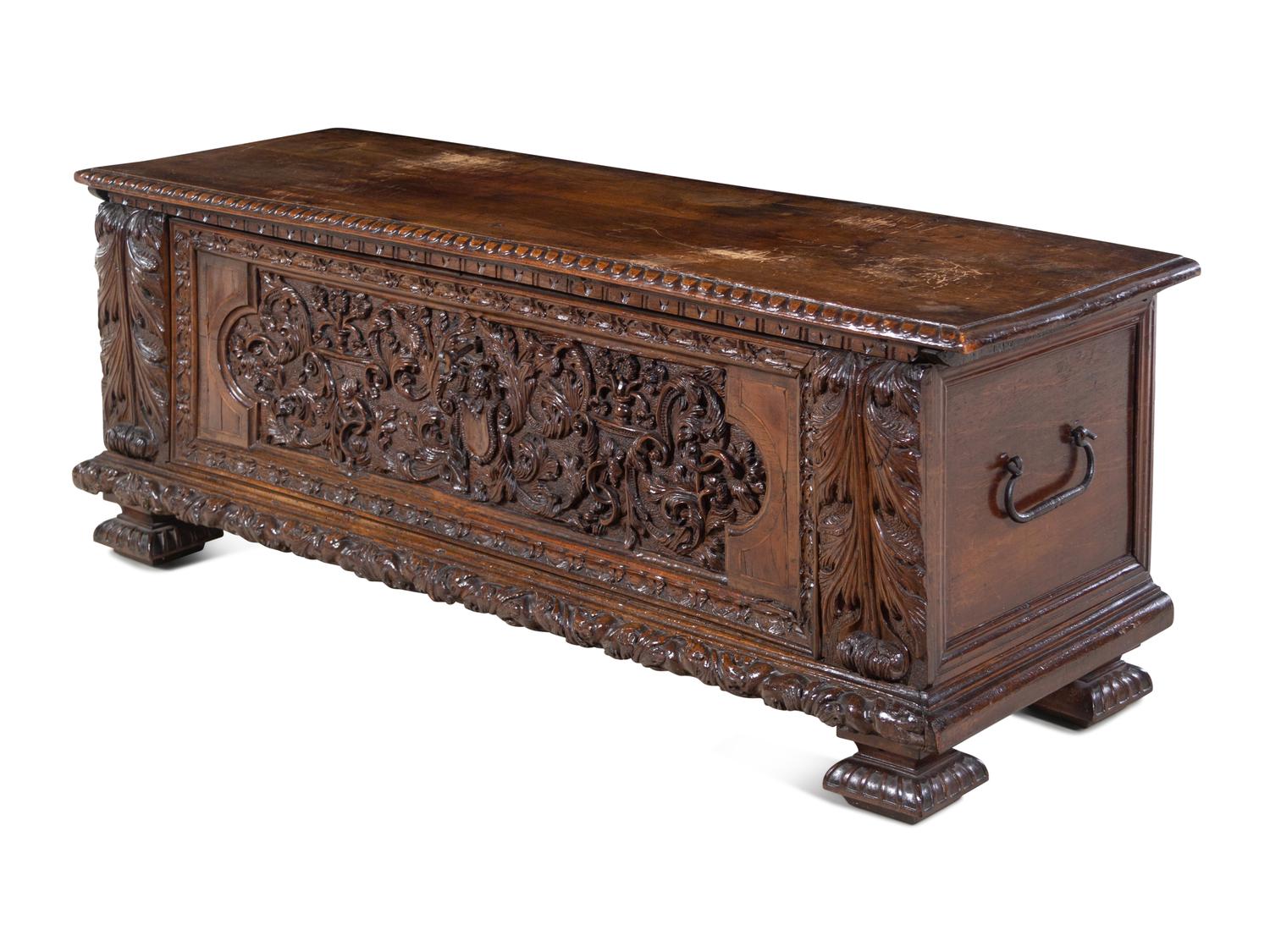 An Italian Carved Walnut Cassone