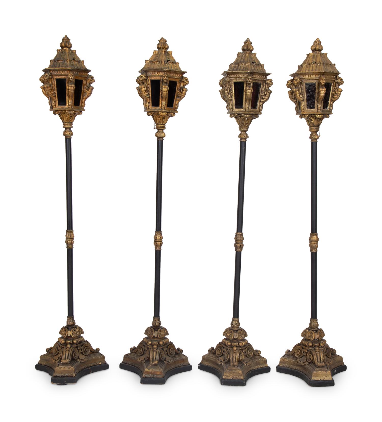 Four Italian Giltwood Gondola Lanterns on Ebonized Supports