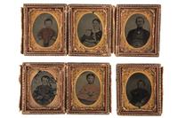[EARLY PHOTOGRAPHY]. Family photographs, a group of images, prints, and rare ninth plate "Family Case" containing portraits of family members.