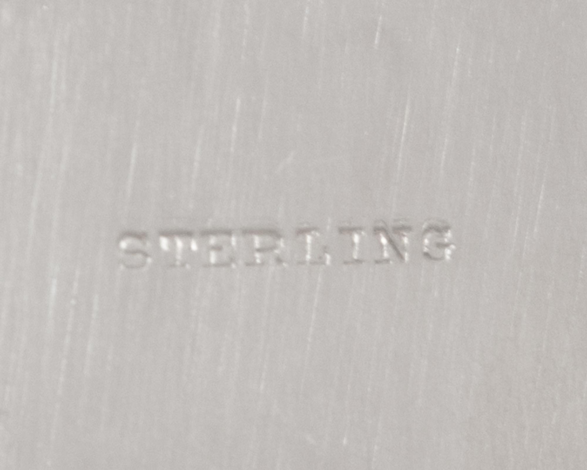 A Set of Twelve American Silver Bread Plates
