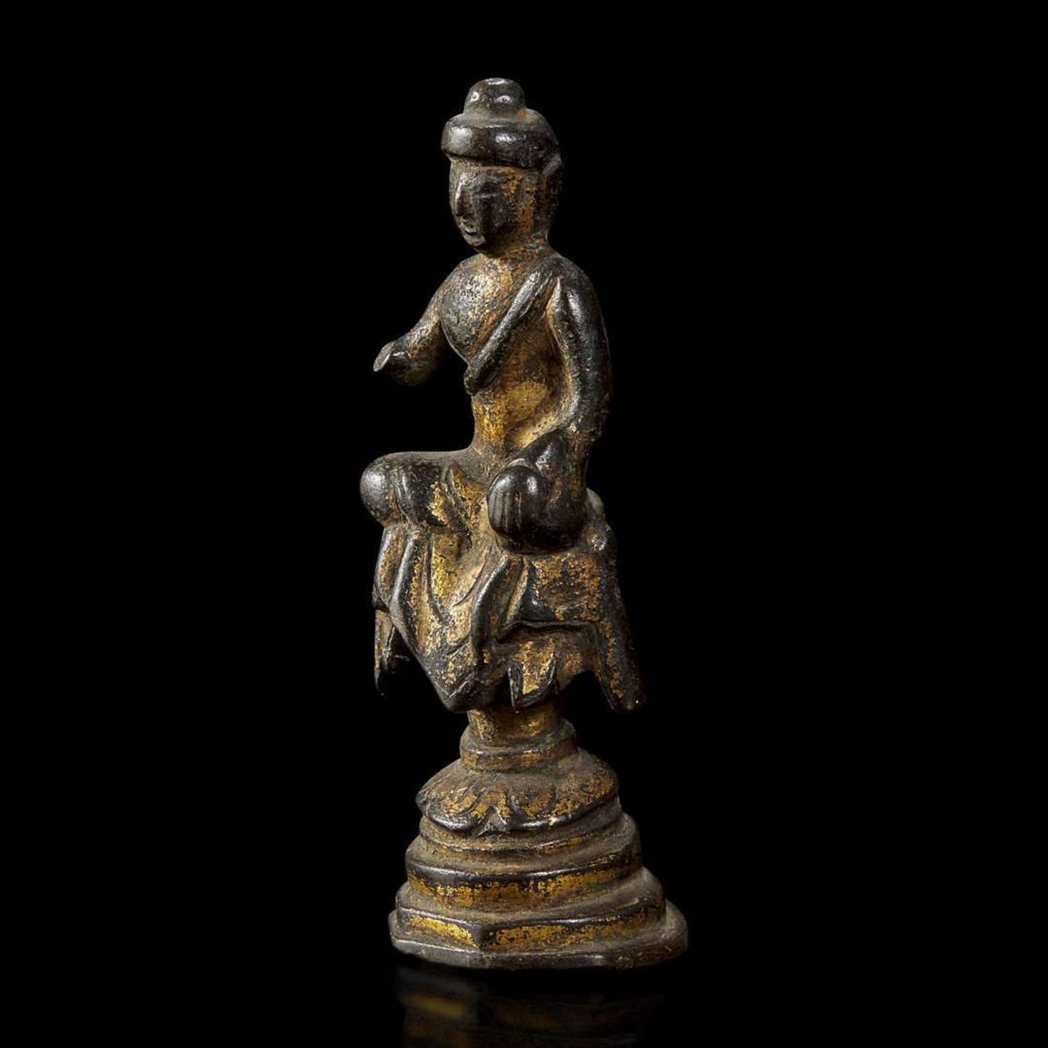 A small gilt bronze figure of a seated Buddha 铜鎏金佛造像一尊 Possibly Tang dynasty ??