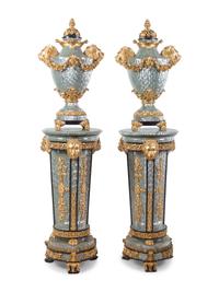 A Pair of Neoclassical Style Gilt Composite and Abalone Veneered Urns and Pedestals