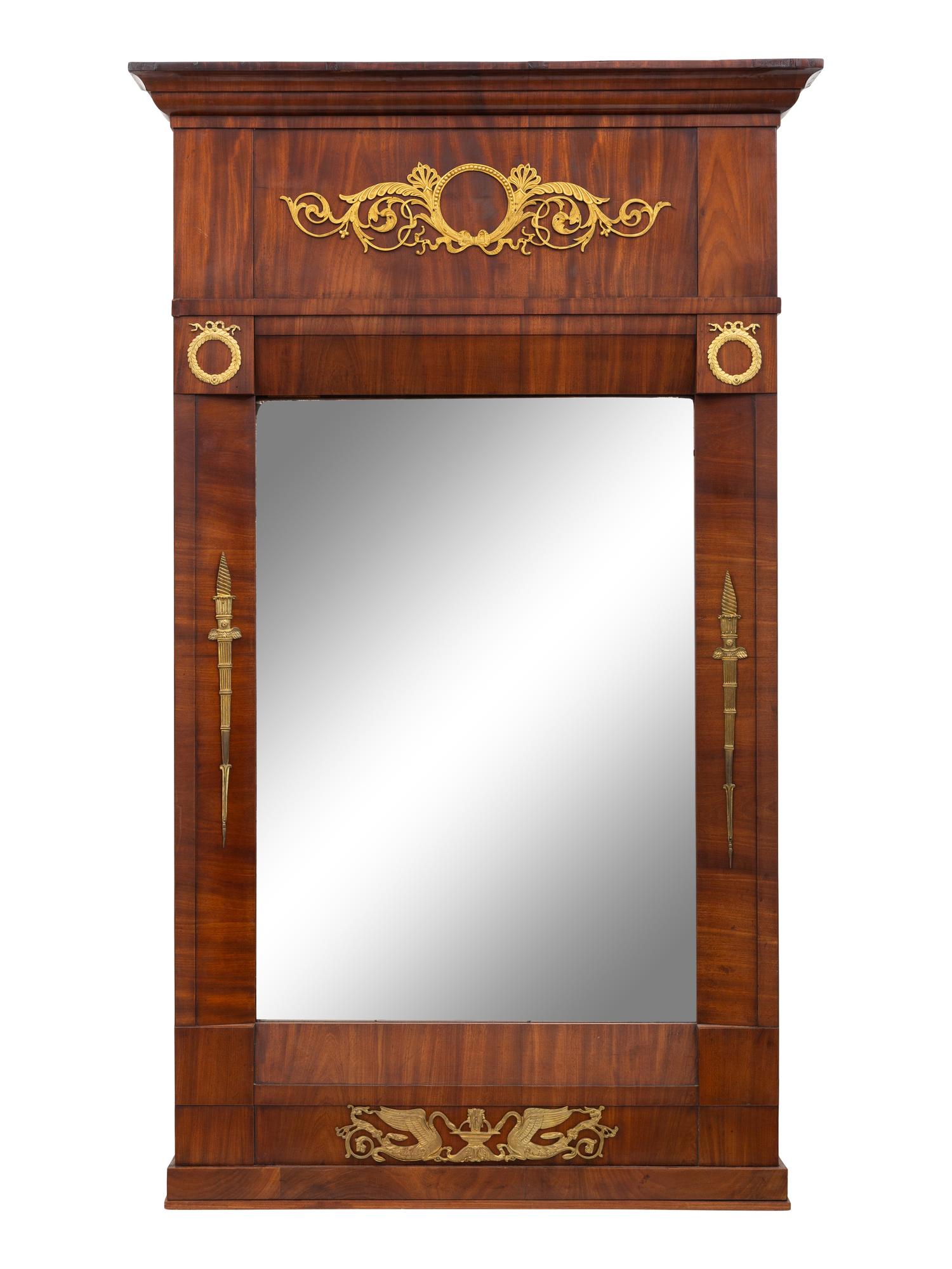 An Empire Brass Mounted Mahogany Mirror