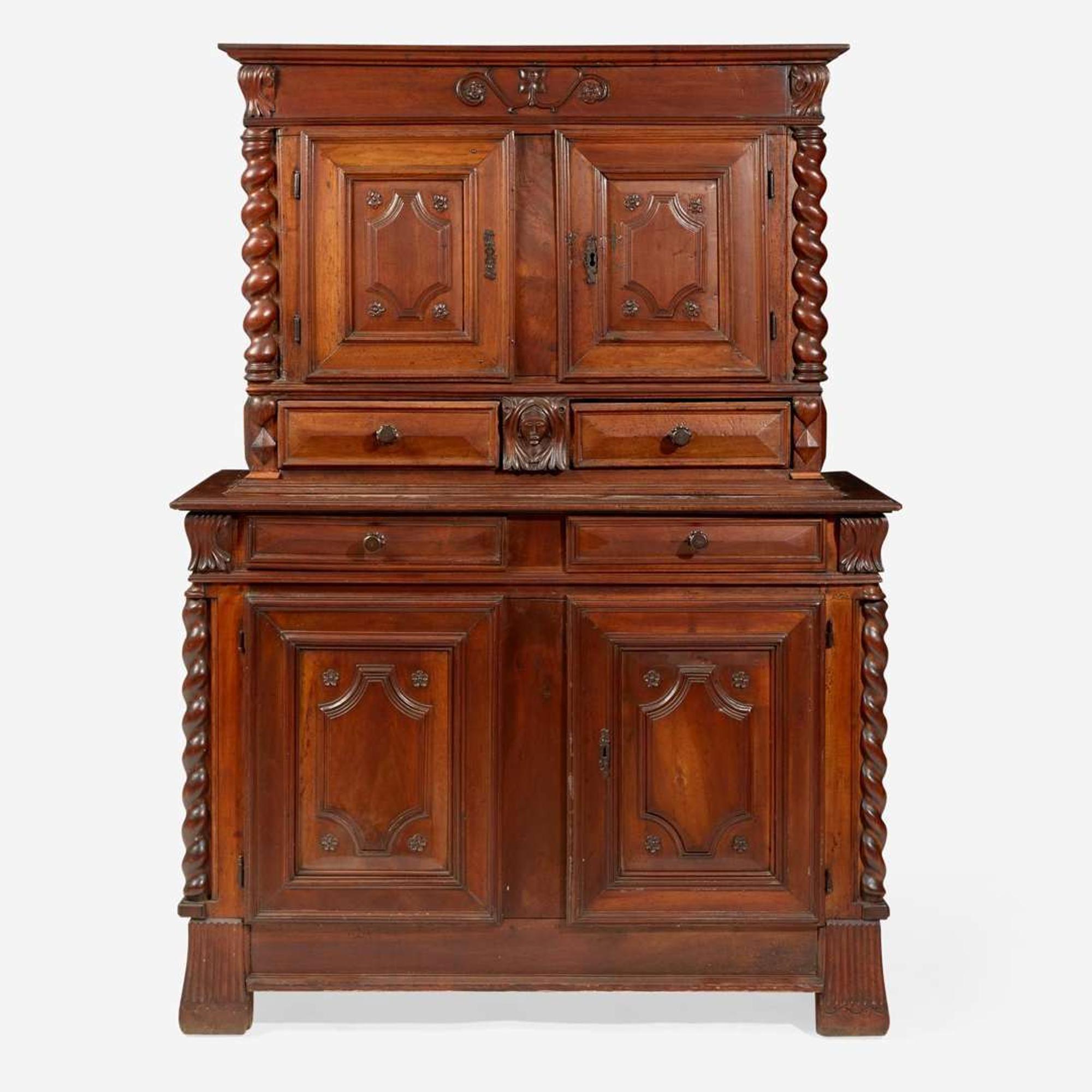A Louis XIV walnut step-back cupboard, 17th century with later modifications