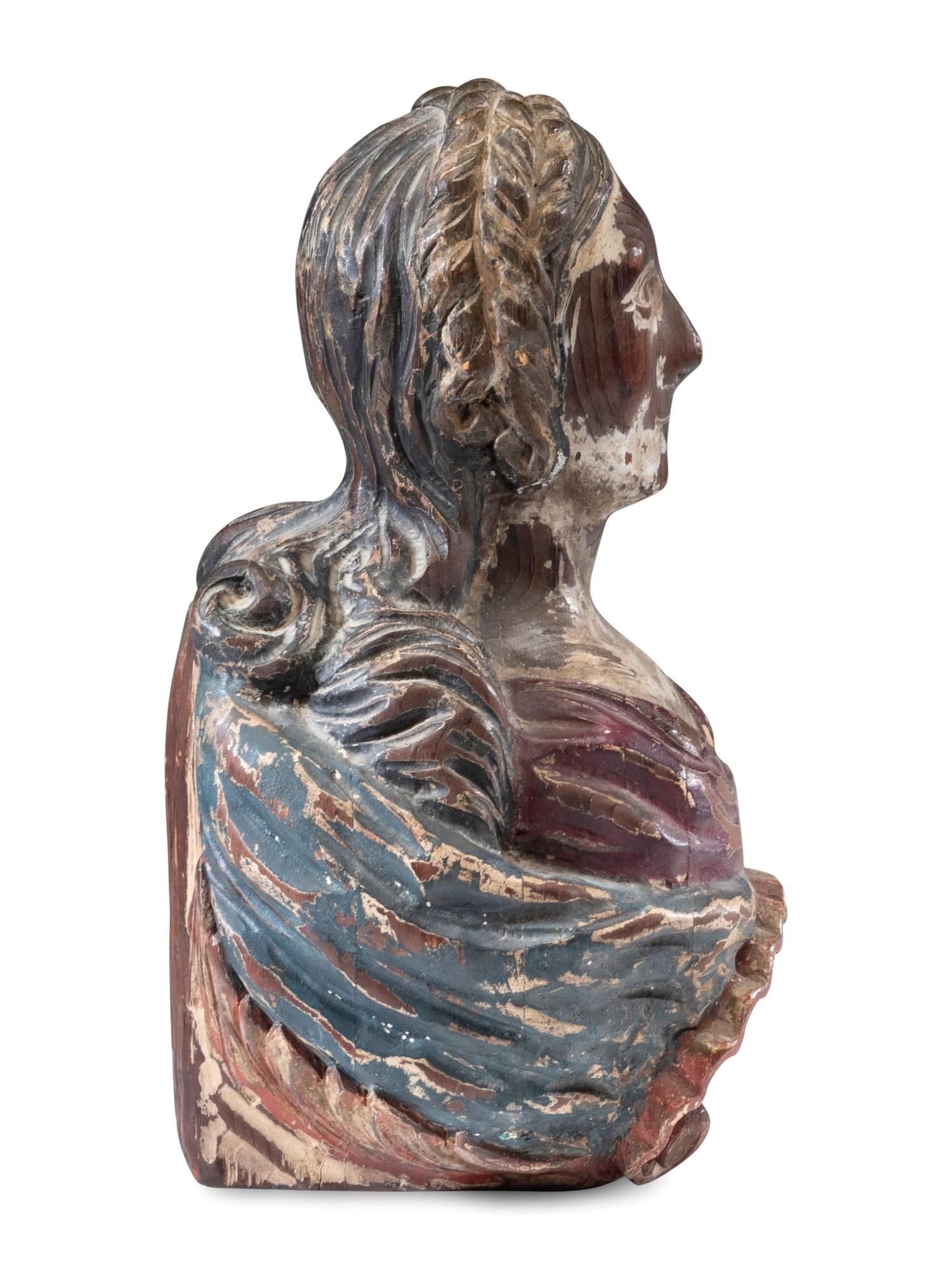 An American Carved and Painted Pine Nautical Figurehead