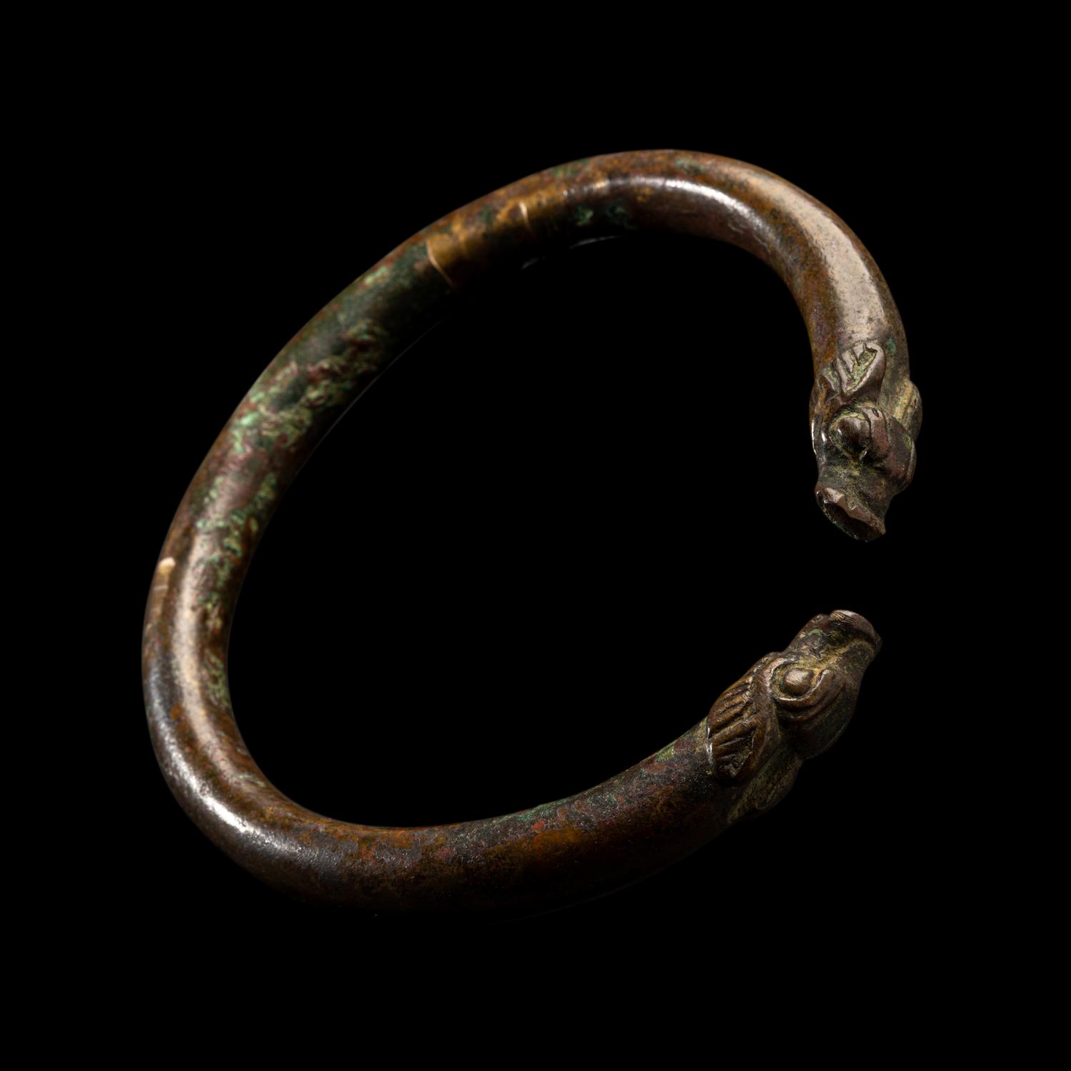 An Achaemenid or Lydian Bronze Bracelet with Calf-head Terminals