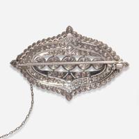 A Platinum and Diamond Brooch